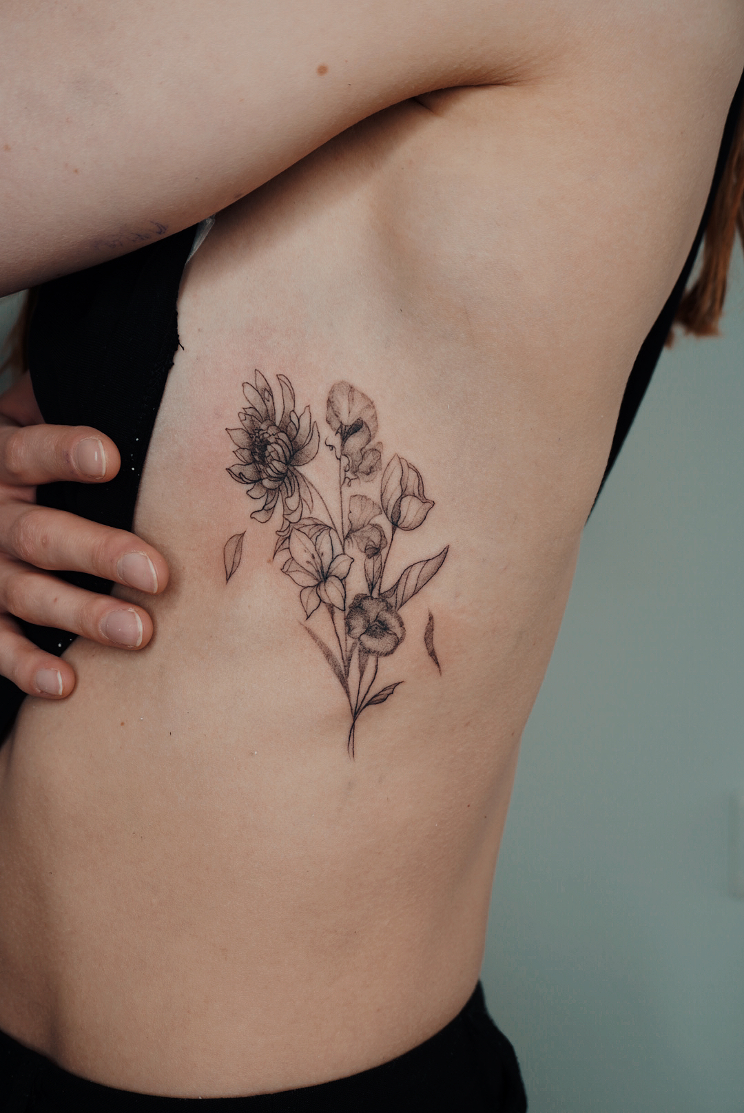 Helsinki-tattoo-Mayink-realistic-floral-side-bouquet.jpg