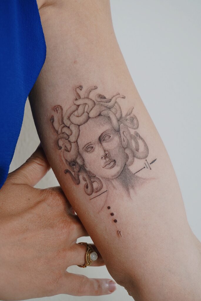 Helsinki-tattoo-Mayink-realistic-medusa-and-swords.jpg