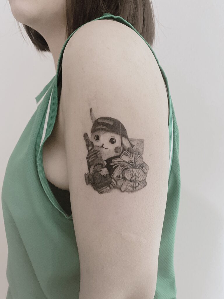 Tattoo-Helsinki-Realistic-Minirealism-pikachu-pokemon-gun-cute-scaled.jpg