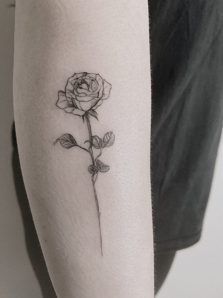 Tattoo-Helsinki-blackwork-rose-floral-realistic-scaled.jpg