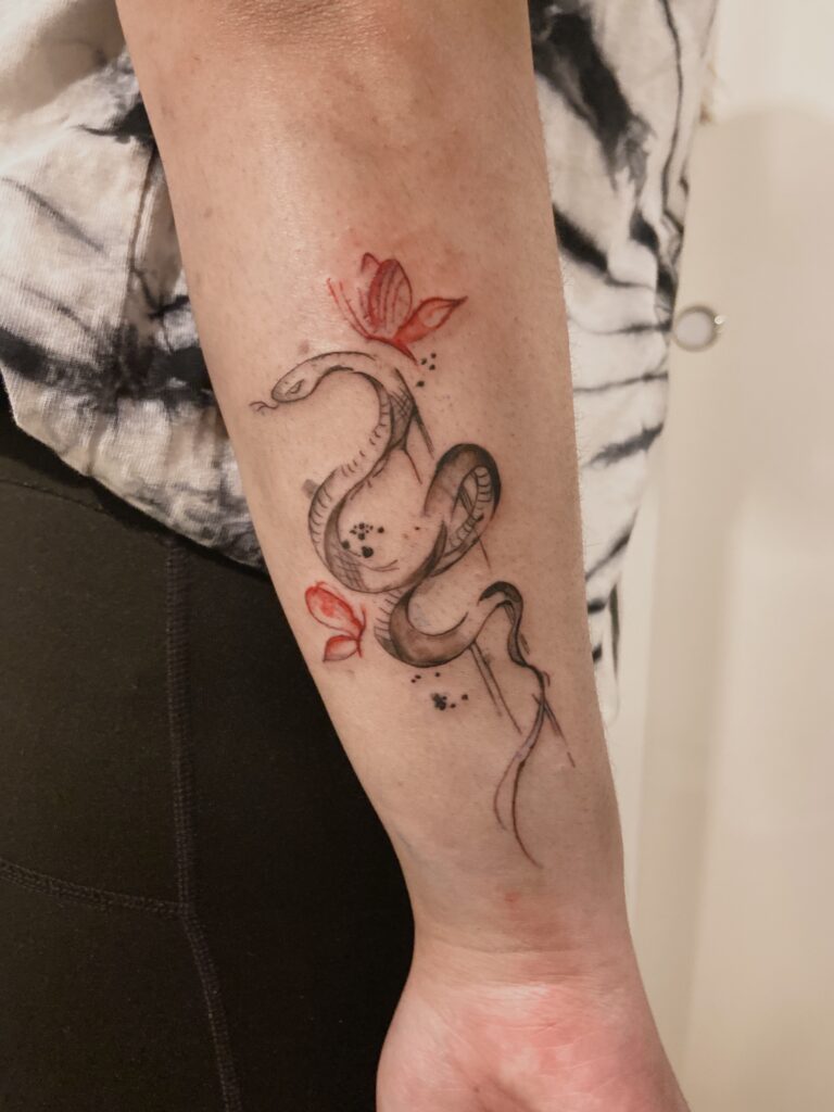 Tattoo-Helsinki-blackwork-snake-and-butterflies-realistic-scaled.jpg