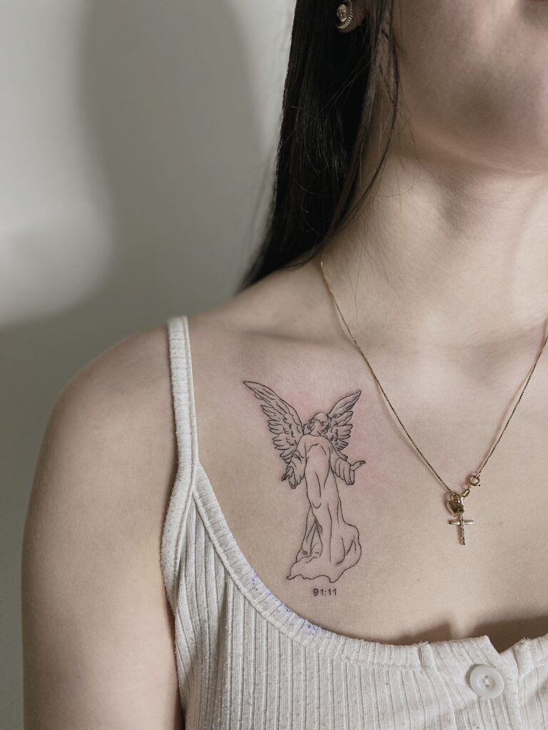 Tattoo-Helsinki-linework-angle-collar-bone-scaled.jpg