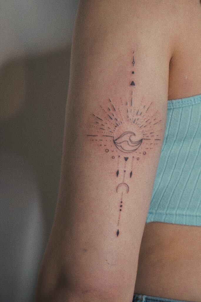 Tattoo-Helsinki-linework-sun-wave-moon-sparkle-drop.jpg