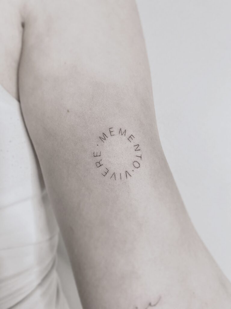 Tattoo-Helsinki-text-line-textwork-circle-scaled.jpg