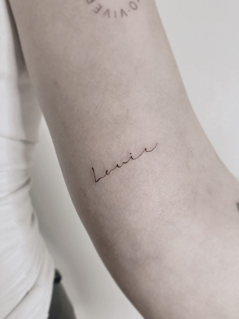 Tattoo-Helsinki-text-line-textwork-handscript-scaled.jpg