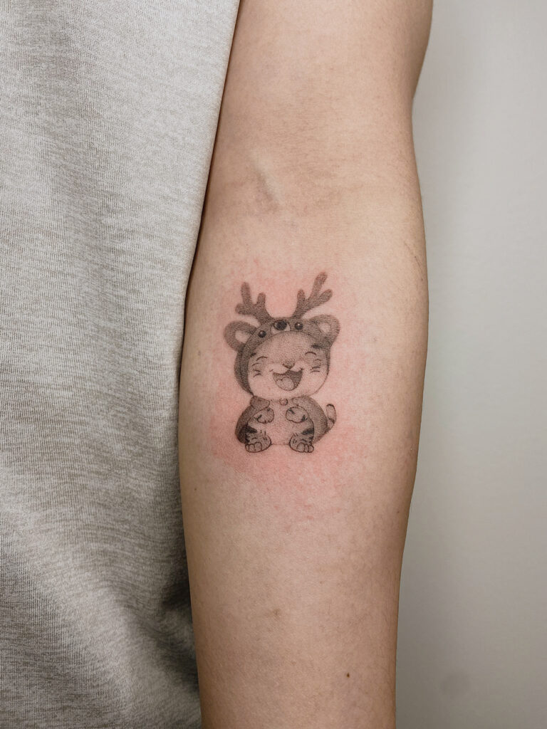 tattoohelsinki-cute-tiger-tattoo-design.jpg
