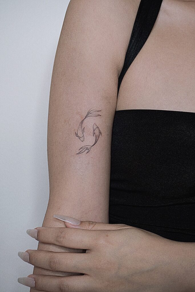 tattoohelsinki-koifish-fineline.jpg