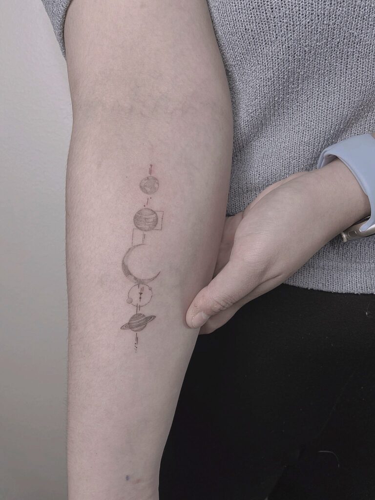 tattoohelsinki-planets-realism-tattoo-design.jpg