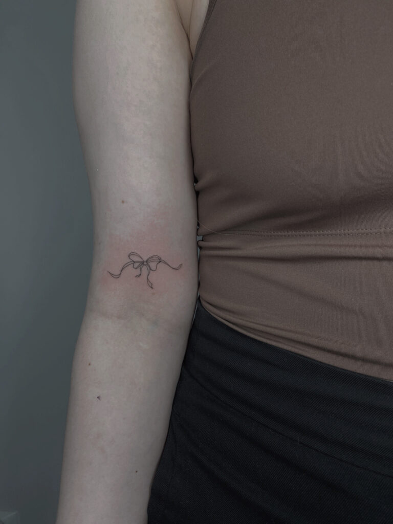 tattoohelsinki-ribbon-fineline-tattoo-design.jpg