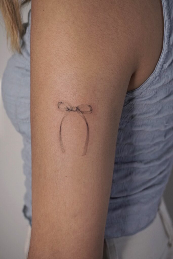 tattoohelsinki-ribbon-tattoo-realism.jpg