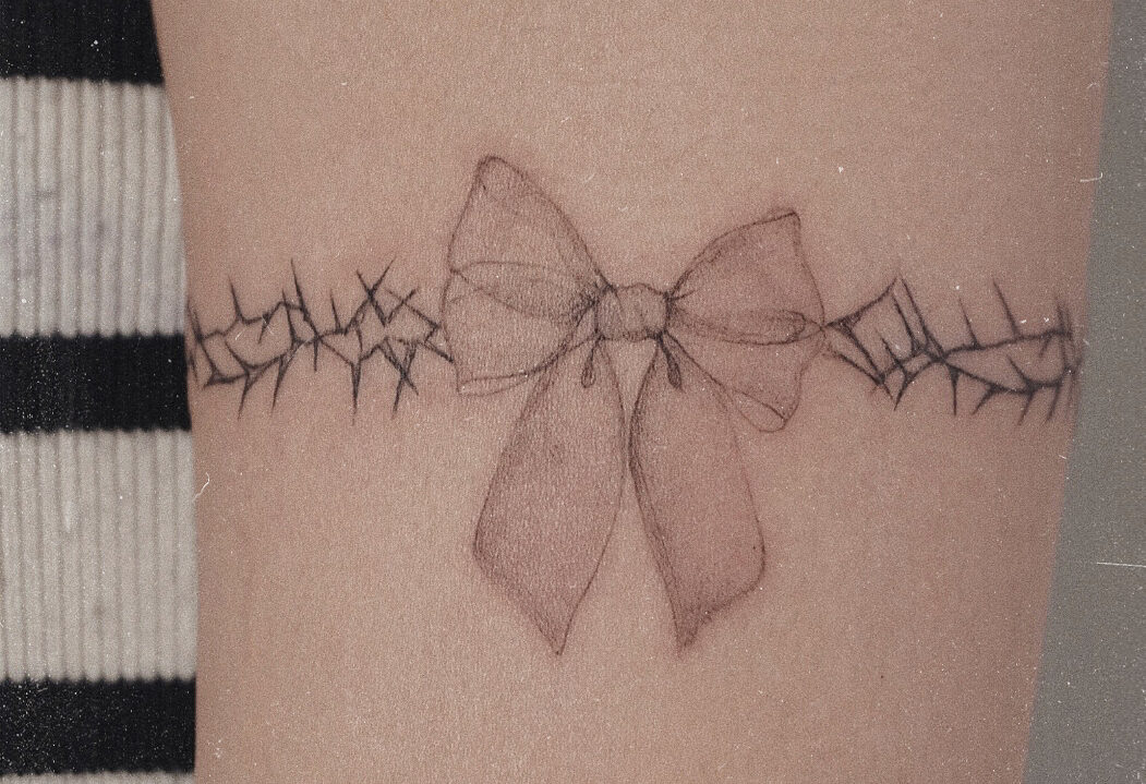 Ribbon tattoo