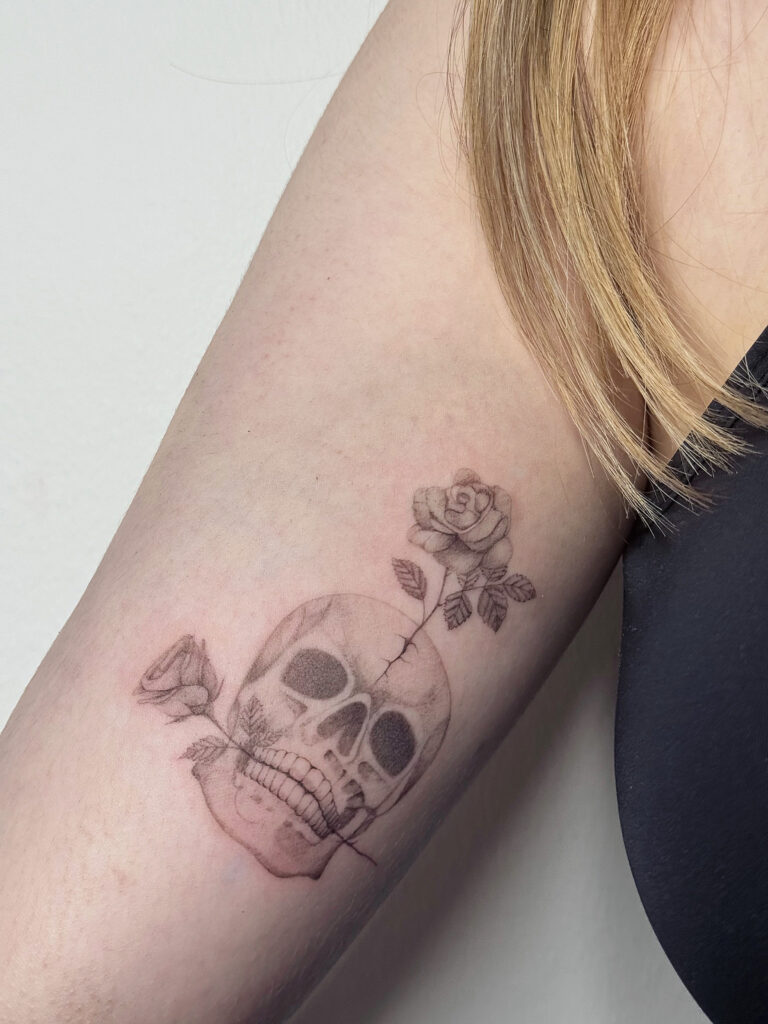 tattoohelsinki-skull-and-rose-tattoo-realism-design-1-scaled.jpg