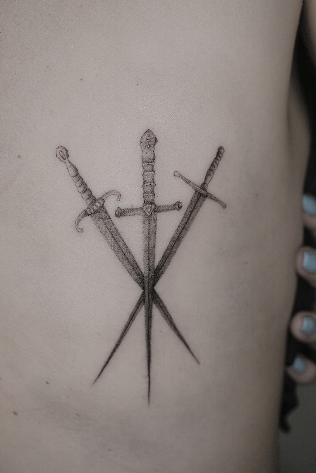tattoohelsinki-swords-realism-tattoo-design.jpg