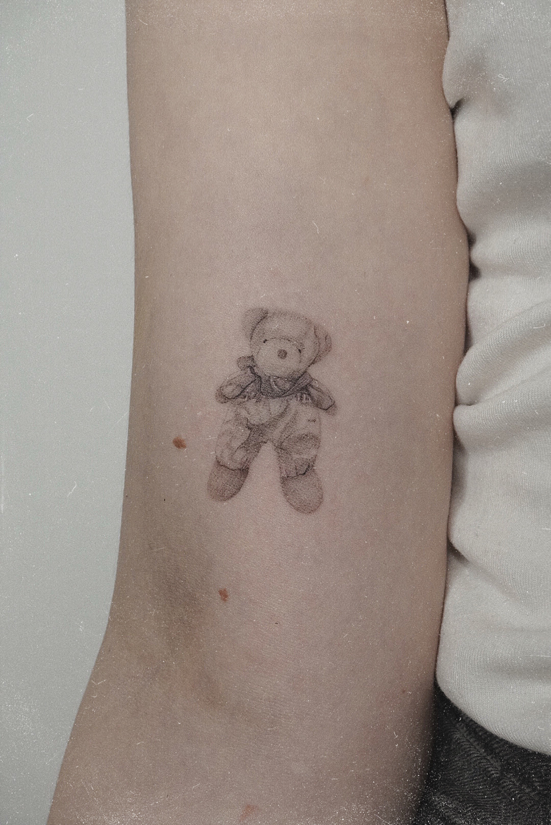 Teddy bear tattoo