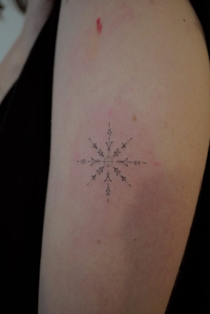 snow flake tattoo