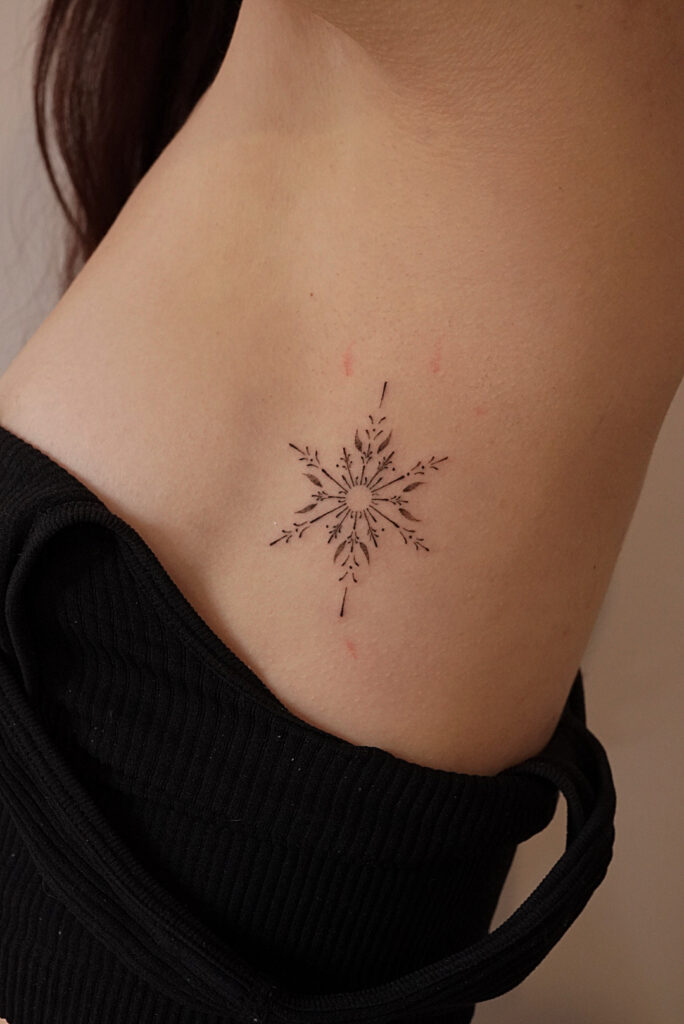 snow flake tattoo
