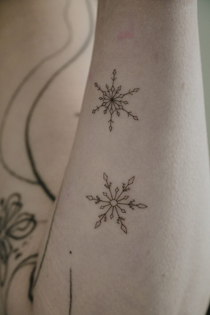 snow flake tattoo